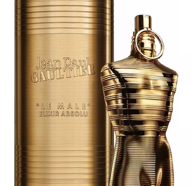 Jean Paul Gaultier Le Male Elixir Absolu luxury men's fragrance in a gold torso bottle and matching tin.