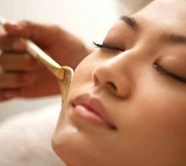 woman getting facial treatment