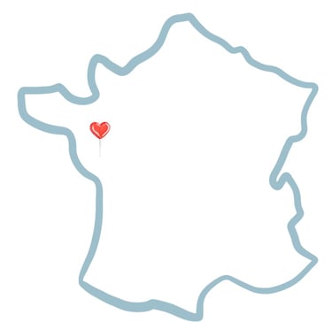 Icône de carte de France avec un cœur ciblé, symbolisant des confections upcyclées locales