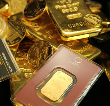 gold bars and coins representing long term potential of gold ira for retirement