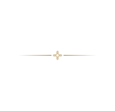 Gold Zia sun symbol divider with elegant horizontal lines on a black background for Southwestern design.