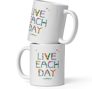Ceramic mugs with the words Live Each Day printed on both sides in tropical exotic wordart