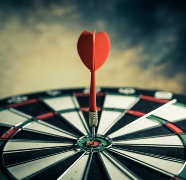 flechette dans le mille d'une cible