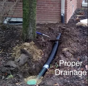 affordable mold removal image of proper draininage installed at a residence.  french drain style 