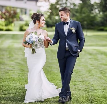 a bride and groom walking down the aisle of a wedding