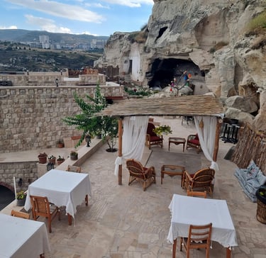 restaurant terrace with a gazeboar and tables. Market Positioning for Tourism with Timea Pokol