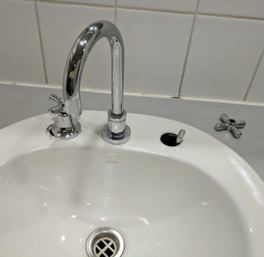 broken basin mixer tap