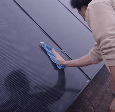 Solar panel installation being cleaned
