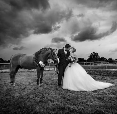 photographer florent wedding saint omer lille a bride and groom standing in a field with a horse