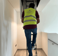 Engineer inspection roof during villa inspection in Abu Dhabi