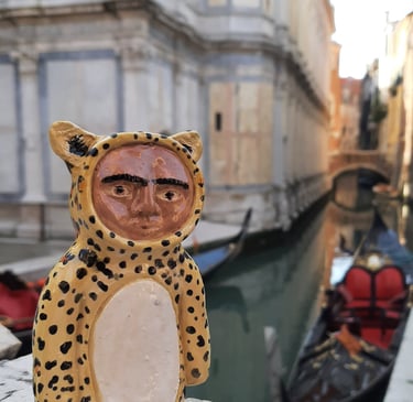 handmade ceramic leopard ceramic figurine visiting venice