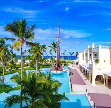 Luxury Punta Cana resort with palm trees, pools, and ocean views in the Dominican Republic