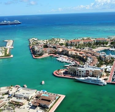 Luxury yachts and waterfront resorts at Marina Cap Cana, Dominican Republic