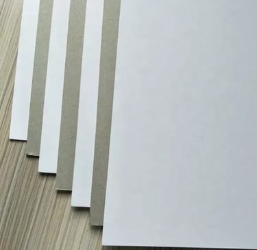 a stack of white paper with a white background