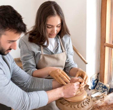a sugar mommy and sugar baby are making pottery pottery pots