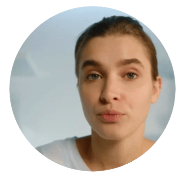 Young women headshot, with light brown hair pulled back.