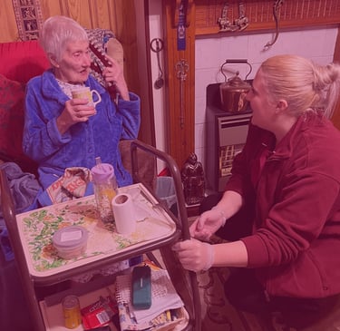 A woman having a conversation with an AMG Nursing employee