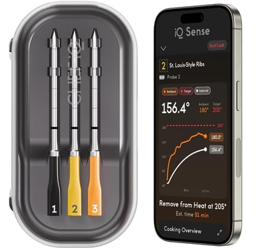 Wireless smart meat thermometer probes in a charging case next to a mobile app tracking BBQ temperatures.