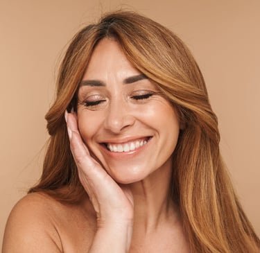 woman posing with a big smile on her face
