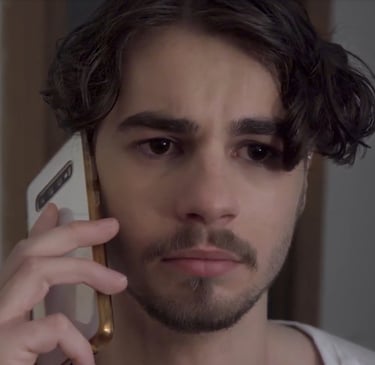 a man with a phone phone in his hand