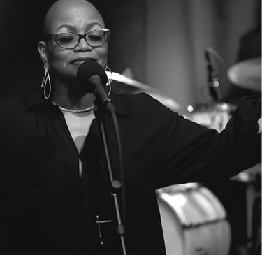 Tiya Adé, vocalizing a classic tune.