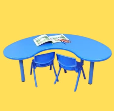 a blue table with a magazine and a magazine