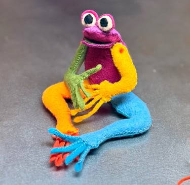 patchwork frog sculpture made of felt