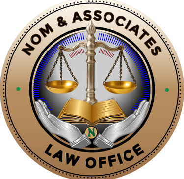 Professional Nom and Associates Law Office seal featuring golden scales of justice and a law book.