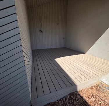 a wooden deck with a wooden decking area and a wooden deck