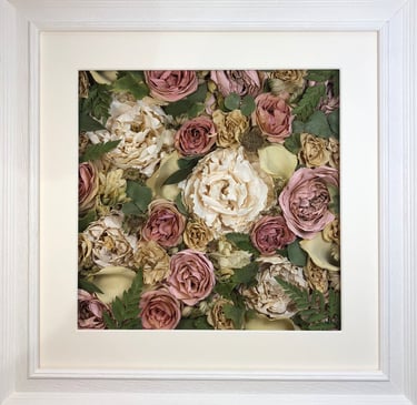a Flower Wall Style bouquet of flowers in a ridged white frame