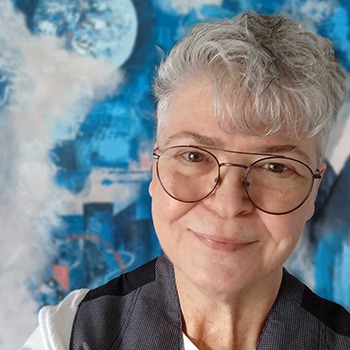 Lillian Cozart with abstract blue background