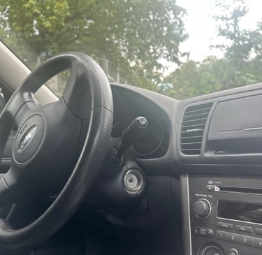 Ignition of a Subaru representing auto locksmith services including lockout, key duplication, & ignition repair