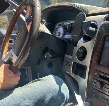 Ignition repair in Woodfin NC with locksmith working inside vehicle