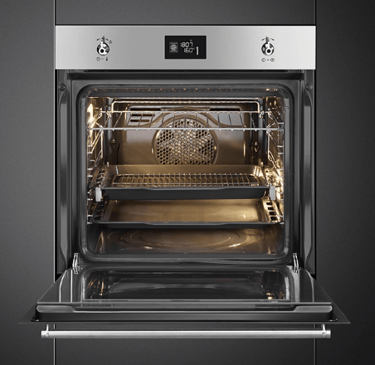 The interior of a clean oven looking like new