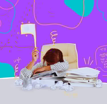 A woman holds a white flag above her head, with her head on her desk surrounded by scattered papers