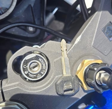 Key on an ignition representing locksmith key duplication in Asheville, NC