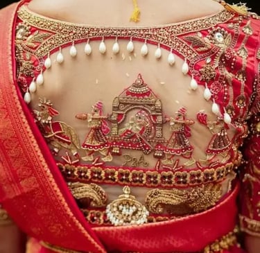 a woman in a red sari sari with a gold necklace