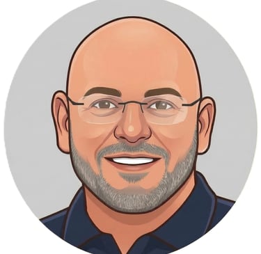 Professional digital portrait of a smiling bald man with a grey beard and glasses.
