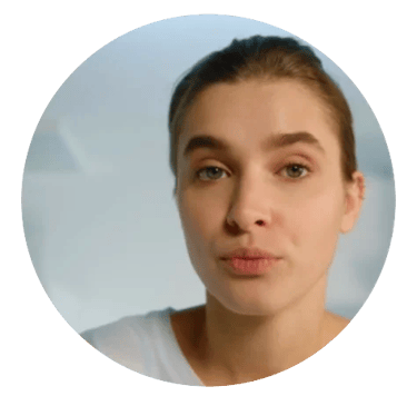 Young women headshot, with light brown hair pulled back.
