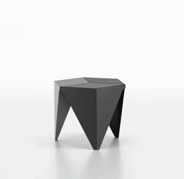 Black sculptural stool with folded geometric form, reflecting Noguchi-inspired visual lightness in f
