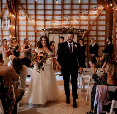Bowen island rustic couple walking down the isle
