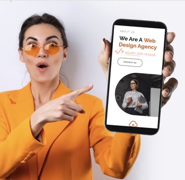 a woman in a suit and sunglasses holding a phone