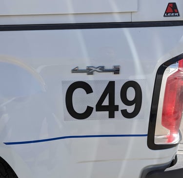 "Fleet of vehicles with uniform decals featuring consistent branding and graphics across all units."