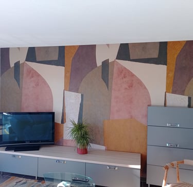 Revêtement mural de plusieurs couleurs, tons orangés et rosés, réalisé par Entreprise Couleurs Bassi