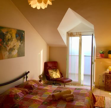 fire bedroom with a bed and a chair