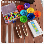 a variety of colorful plastic balls and plastic beads