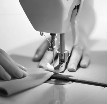 Close-up of precision sewing process at King Fly's manufacturing facility.