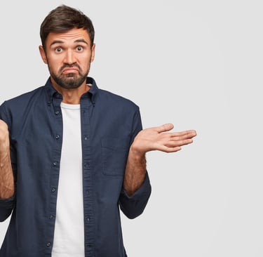 a man with a beard and a beard, holding his hands out and looking surprised
