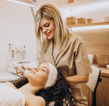 a woman getting a facial lift in a beauty salon