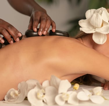a woman getting a massage at a spa